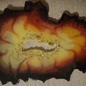 Firelight Resin geode slice with center ring of crystals-stand included