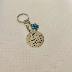‘sorry I can’t, I have plans with my dog’ hand stamped keychain
