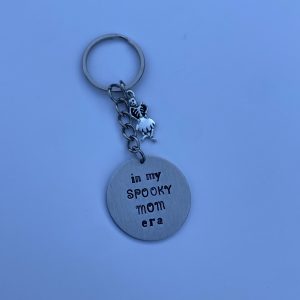 ‘in my spooky mom era’ hand stamped keychain