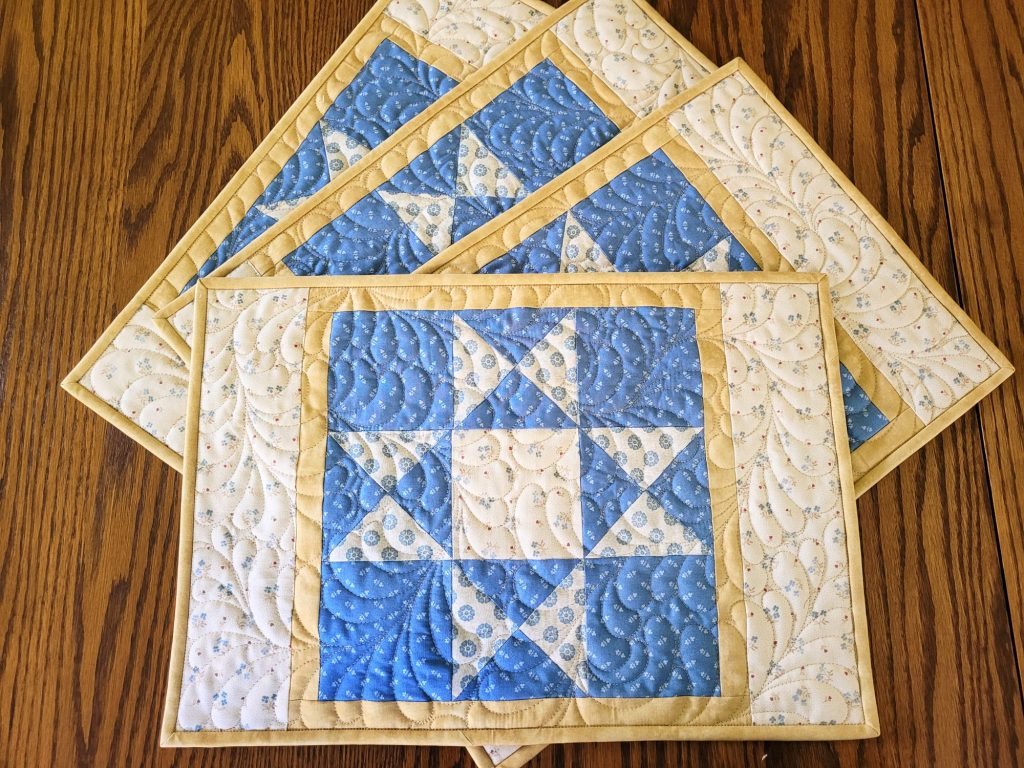 set of four quilted placemats